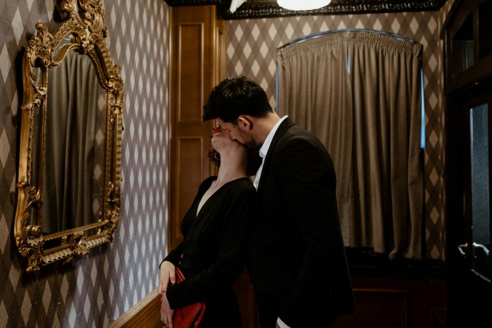 A man and woman embracing each other 