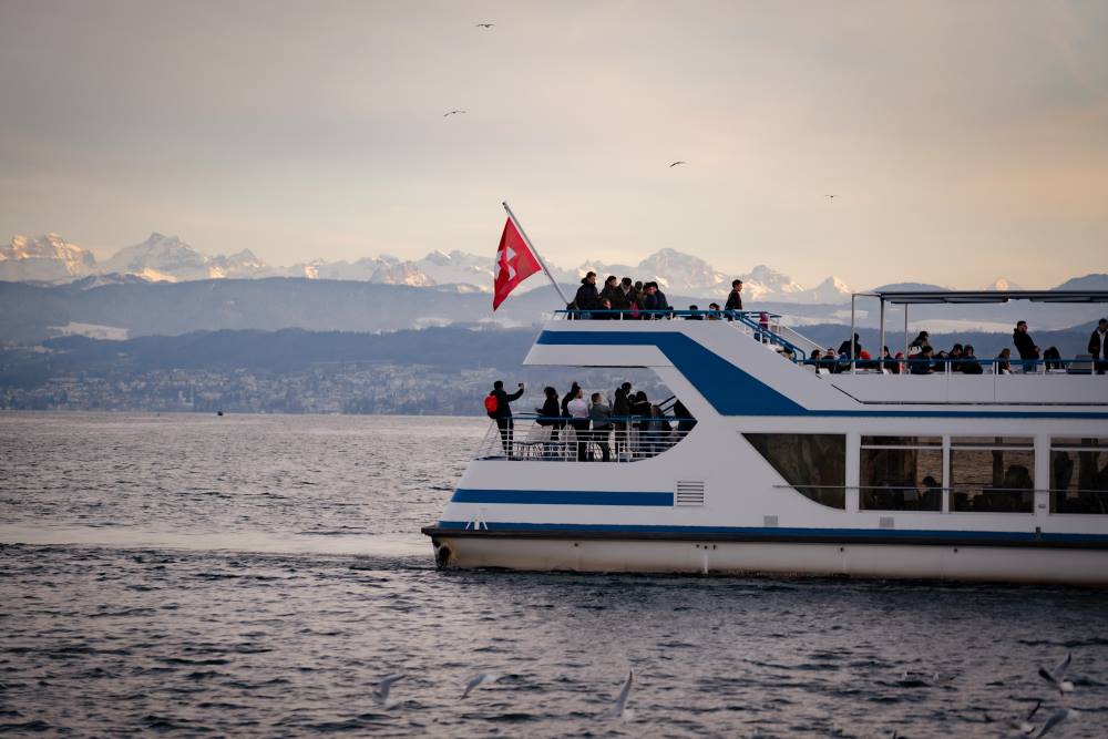 Scenic Boat Ride on Lake Zurich at Dusk