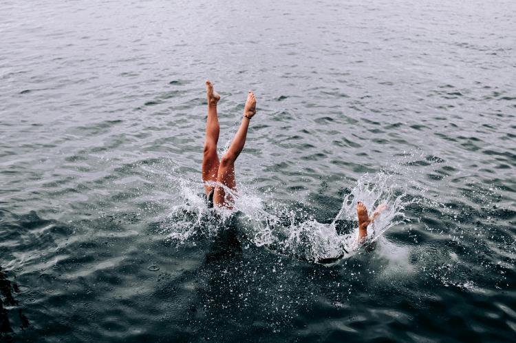 2 Person Swimming in the Ocean