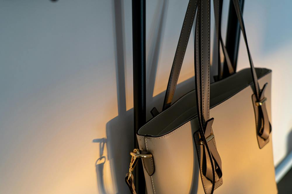 A tote handbag hanging on a wall